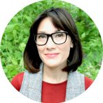 JJ Dearborn stands in front of vegetation